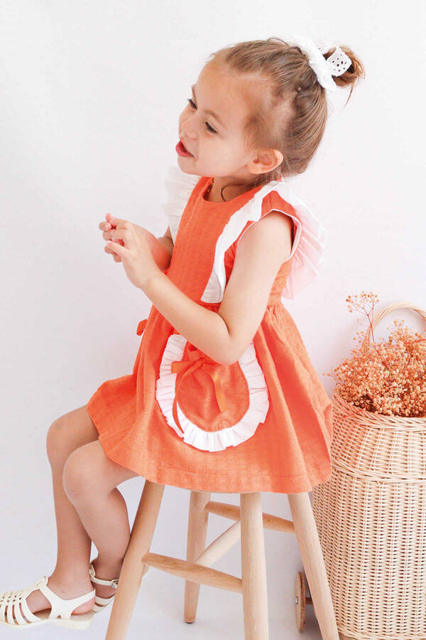 SSY22 - Turuncu Fırfırlı ve Cep Detaylı Kız Çocuk Elbise (1)