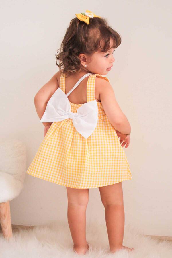 SSY22 - Sarı Mini Pötikare Sırtı Fiyonklu Kız Çocuk Elbise ve Çanta 2'li Takım